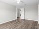 Bedroom with a doorway and window providing natural light at 106 Desert Sky Ct, Statesville, NC 28625