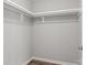Walk-in closet showing top shelf for storage at 106 Desert Sky Ct, Statesville, NC 28625