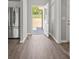 An entryway featuring durable floors leading to an open door, offering a glimpse of the outdoors at 106 Desert Sky Ct, Statesville, NC 28625