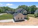 Two-story home features an attached garage and well-manicured landscaping at 106 Desert Sky Ct, Statesville, NC 28625