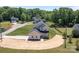 Two-story home on a spacious lot, showcasing its modern design and charming curb appeal at 106 Desert Sky Ct, Statesville, NC 28625