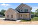 Two-story home with a covered front porch and modern siding at 106 Desert Sky Ct, Statesville, NC 28625