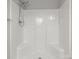 Bright shower tub showing the shower head and the walls of the shower at 106 Desert Sky Ct, Statesville, NC 28625