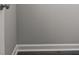 Neutral grey wall and white trim creates a minimalist and modern aesthetic at 106 Desert Sky Ct, Statesville, NC 28625