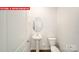 Powder room includes pedestal sink and toilet at 11135 Cardinal Creek Ave, Charlotte, NC 28215