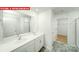 Bathroom featuring double sink vanity, large mirror, and tile flooring at 11135 Cardinal Creek Ave, Charlotte, NC 28215