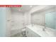 Bathroom with double vanity, large mirror, and shower-tub combination at 11135 Cardinal Creek Ave, Charlotte, NC 28215