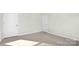 Neutral bedroom with two doors offers privacy and flexible use of space at 11135 Cardinal Creek Ave, Charlotte, NC 28215