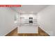 Modern kitchen features granite countertops, stainless appliances, and a center island at 11135 Cardinal Creek Ave, Charlotte, NC 28215