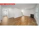 Large living room with fireplace, entryway, and lots of natural light at 11135 Cardinal Creek Ave, Charlotte, NC 28215