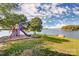 A fun playground by the lake offers a slide and climbing area, perfect for outdoor play and enjoyment at 1119 Palmyra Dr, Tega Cay, SC 29708