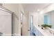 Modern bathroom with dual sinks, quartz countertops, and a glass-enclosed shower at 11216 Cardinal Creek Ave, Charlotte, NC 28215