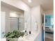 Bright bathroom with dual sinks, a large mirror, and a glass-enclosed shower at 11216 Cardinal Creek Ave, Charlotte, NC 28215