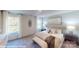 Inviting bedroom featuring plush carpeting, large windows, and stylish decor for a cozy and serene atmosphere at 11216 Cardinal Creek Ave, Charlotte, NC 28215
