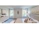 Charming bedroom showcasing a comfortable bed, large windows, and stylish decor, creating a cozy and inviting atmosphere at 11216 Cardinal Creek Ave, Charlotte, NC 28215