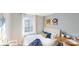 Cozy bedroom filled with natural light, comfy bed, stylish decor, and a window view at 11216 Cardinal Creek Ave, Charlotte, NC 28215