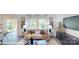 Bright living room featuring modern furnishings, large windows, and stylish decor for a comfortable and inviting space at 11216 Cardinal Creek Ave, Charlotte, NC 28215