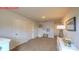 Spacious carpeted loft area with play area and storage at 11221 Cardinal Creek Ave, Charlotte, NC 28215