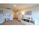 Bright carpeted loft features storage, play area, and modern decor at 11221 Cardinal Creek Ave, Charlotte, NC 28215