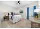 Comfortable bedroom with carpeting, ceiling fan and modern decor at 120 Keats Aly, Cramerton, NC 28032