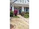 Charming home with a well-manicured front yard and a welcoming entrance at 120 Keats Aly, Cramerton, NC 28032