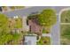 Aerial view of a home showing the rooftop, driveway, and surrounding trees at 1400 Russell Ave, Charlotte, NC 28216