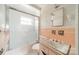Traditional bathroom with a tub shower, retro tiles and classic vanity at 1400 Russell Ave, Charlotte, NC 28216