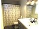 Clean bathroom featuring a floral shower curtain and modern fixtures at 1414 Farmstead Rd, Rock Hill, SC 29732
