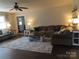 Cozy living room with ample seating, warm lighting, and stylish decor for comfortable living at 1414 Farmstead Rd, Rock Hill, SC 29732