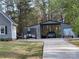 Rear view of outbuilding showing concrete drive and proximity to main house at 1414 Farmstead Rd, Rock Hill, SC 29732