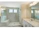 Beautiful bathroom featuring a walk-in shower with tiled walls and a double sink vanity at 1449 Ardmore Dr # 241, Sherrills Ford, NC 28673