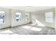 Light-filled bedroom with multiple windows offering neighborhood views and carpeted flooring at 1449 Ardmore Dr # 241, Sherrills Ford, NC 28673