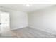 Empty bedroom with plush carpet and a doorway, waiting for your personal touch at 1449 Ardmore Dr # 241, Sherrills Ford, NC 28673