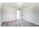 Neutral bedroom with carpet flooring and a double door closet, ideal for a minimalist design at 1449 Ardmore Dr # 241, Sherrills Ford, NC 28673