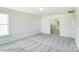 Spacious carpeted bedroom with an ensuite bathroom and ample natural light from a window at 1449 Ardmore Dr # 241, Sherrills Ford, NC 28673