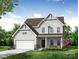 New construction home featuring a two-car garage, beautiful lawn and stone accents for an eye-catching curb appeal at 1449 Ardmore Dr # 241, Sherrills Ford, NC 28673