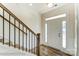 Bright foyer with wood floors, staircase and white front door with sidelights perfect for welcoming guests at 1449 Ardmore Dr # 241, Sherrills Ford, NC 28673