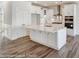 Stunning white kitchen featuring a large island, stainless steel appliances, and elegant tile backsplash at 1449 Ardmore Dr # 241, Sherrills Ford, NC 28673