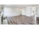 Bright, open-concept living space with hardwood floors, fresh neutral walls, and modern lighting at 1449 Ardmore Dr # 241, Sherrills Ford, NC 28673
