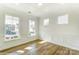 Bright room with hardwood floors, white walls, wainscotting and large windows offering lots of natural light at 1449 Ardmore Dr # 241, Sherrills Ford, NC 28673