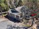 Scenic aerial view of a condo complex, showcasing mature trees, parking, and outdoor space at 1606 Sharon W Rd # 37, Charlotte, NC 28210