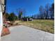 Expansive backyard featuring a concrete patio and a storage shed perfect for outdoor activities at 1730 Martin Rd, Kings Mountain, NC 28086