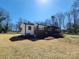 Well-maintained ranch home featuring a brick facade, white siding and a front porch at 1730 Martin Rd, Kings Mountain, NC 28086