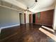 The living room features hardwood floors, brick accent wall, gray walls, and a modern light fixture at 1730 Martin Rd, Kings Mountain, NC 28086