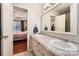 This bathroom features a double vanity, granite countertop, and a view into the main bedroom at 1852 Bon Rea Dr, Rock Hill, SC 29730