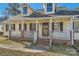 Attractive home with a covered porch, brick foundation, and black window shutters at 1852 Bon Rea Dr, Rock Hill, SC 29730