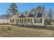Inviting one-story home featuring a classic covered porch and well-maintained landscaping at 1852 Bon Rea Dr, Rock Hill, SC 29730