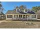 Charming one-story home with a welcoming front porch and dormer windows at 1852 Bon Rea Dr, Rock Hill, SC 29730