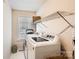Laundry room featuring a washing machine, dryer, shelving and a window at 1852 Bon Rea Dr, Rock Hill, SC 29730