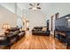 Spacious living room with vaulted ceilings, hardwood floors, and comfortable leather furniture at 1852 Bon Rea Dr, Rock Hill, SC 29730
